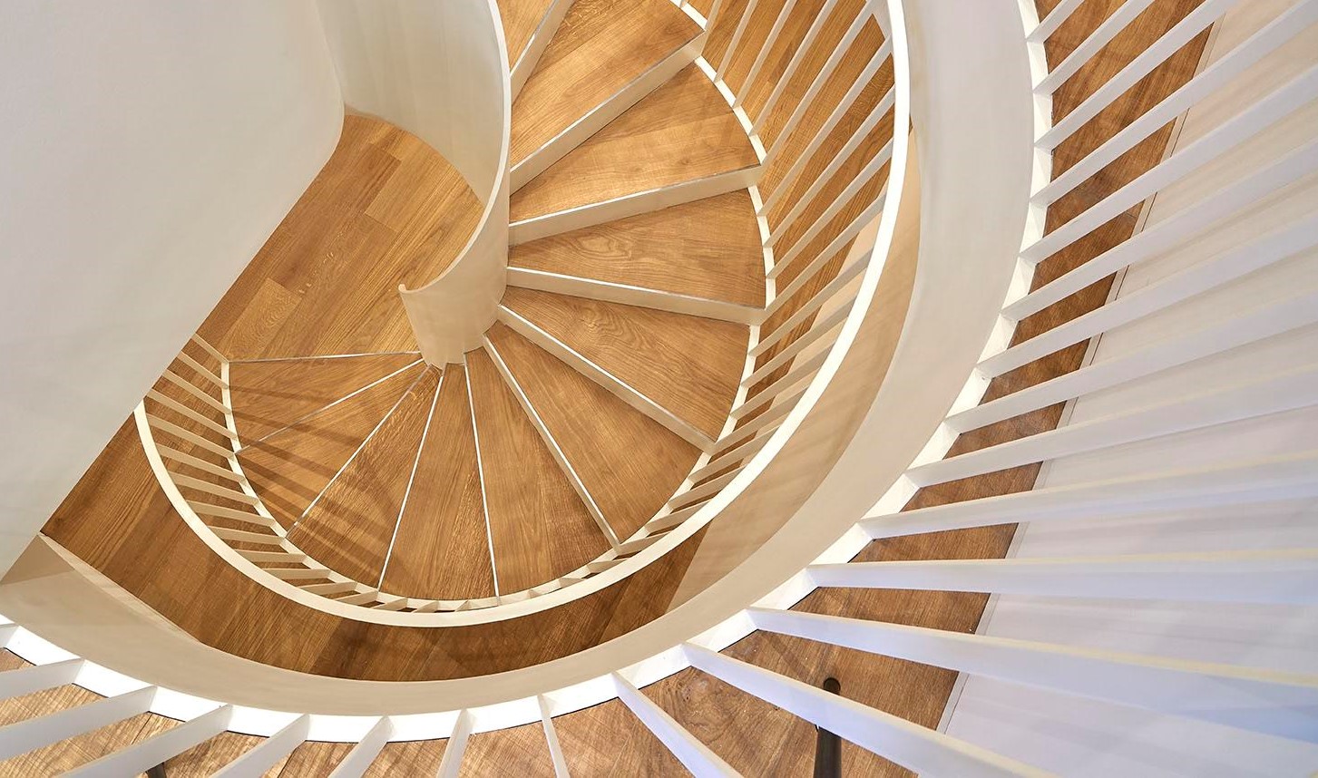 Modern Spiral Staircase in a white powder coated finish