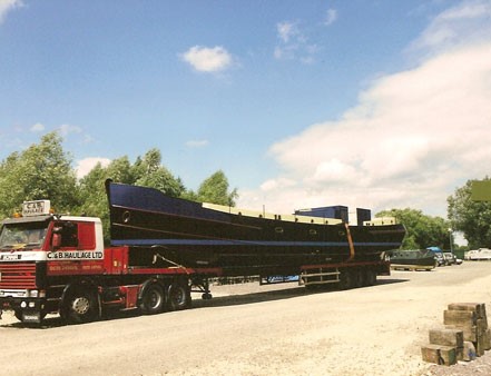 large dutch barge on truck