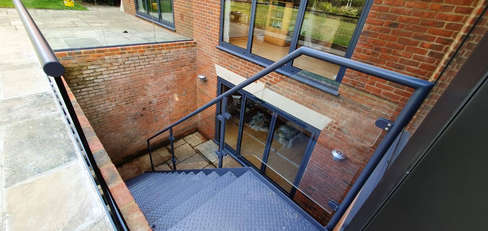 powder coated external staircase with glass balustrade