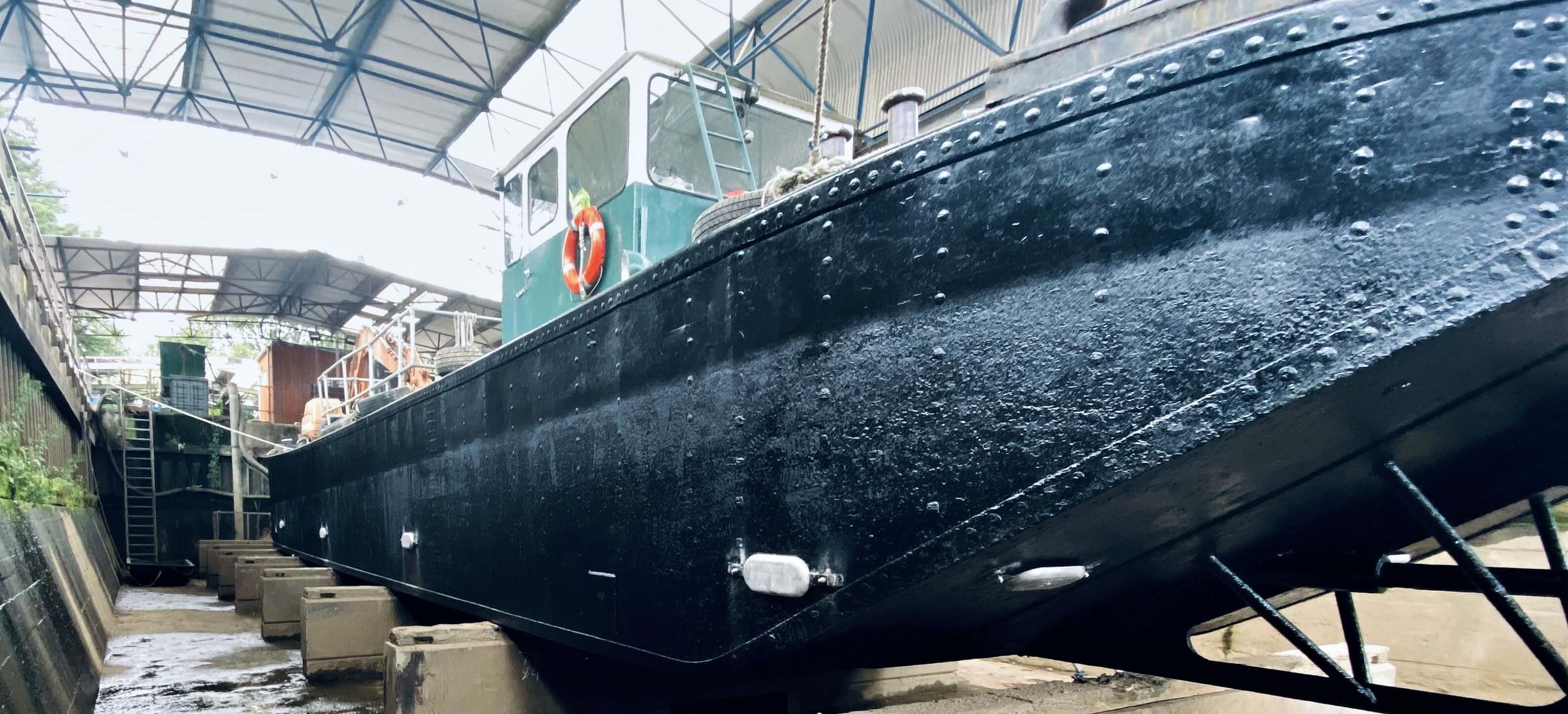 large steel marine vessel up close