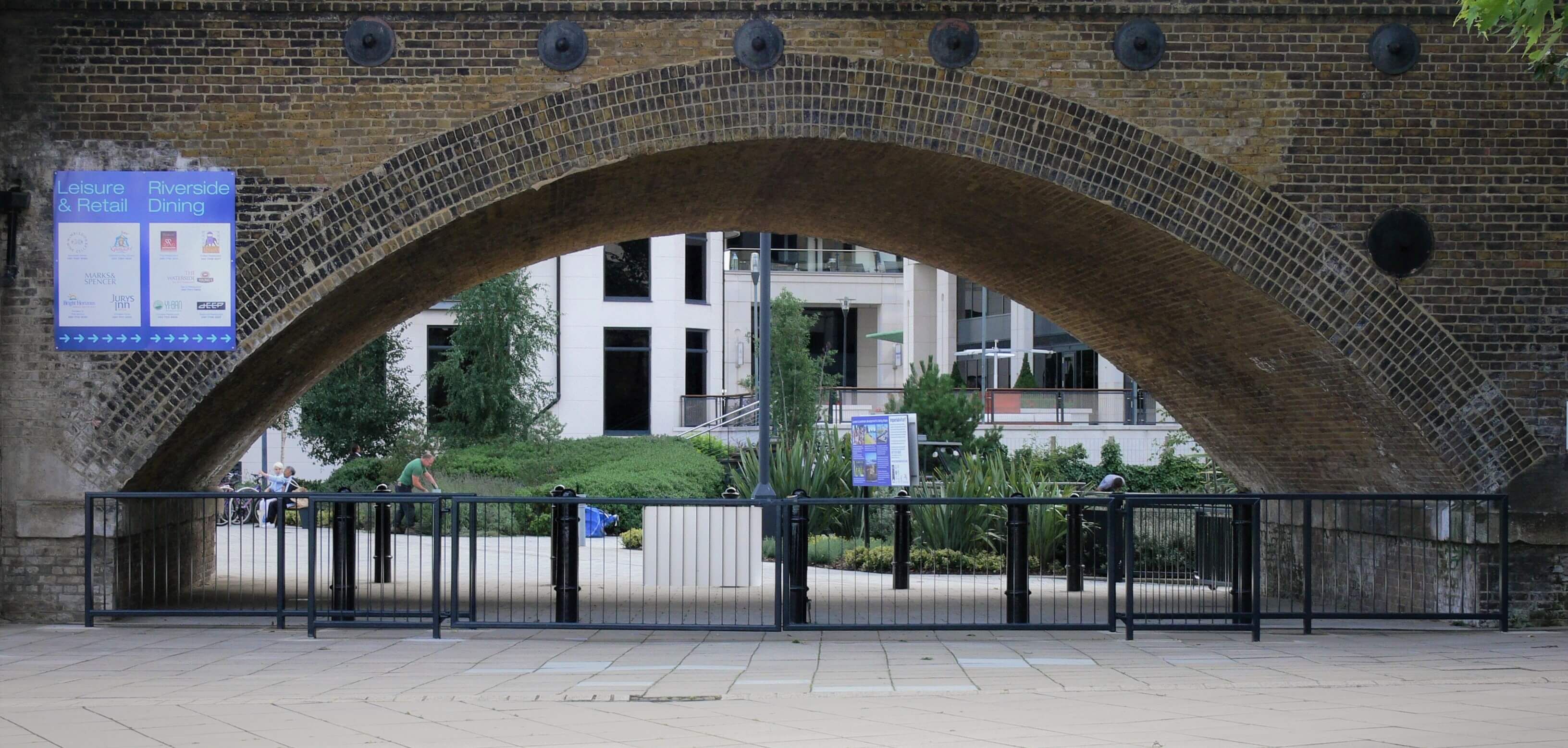 pedestrian gates under public archway