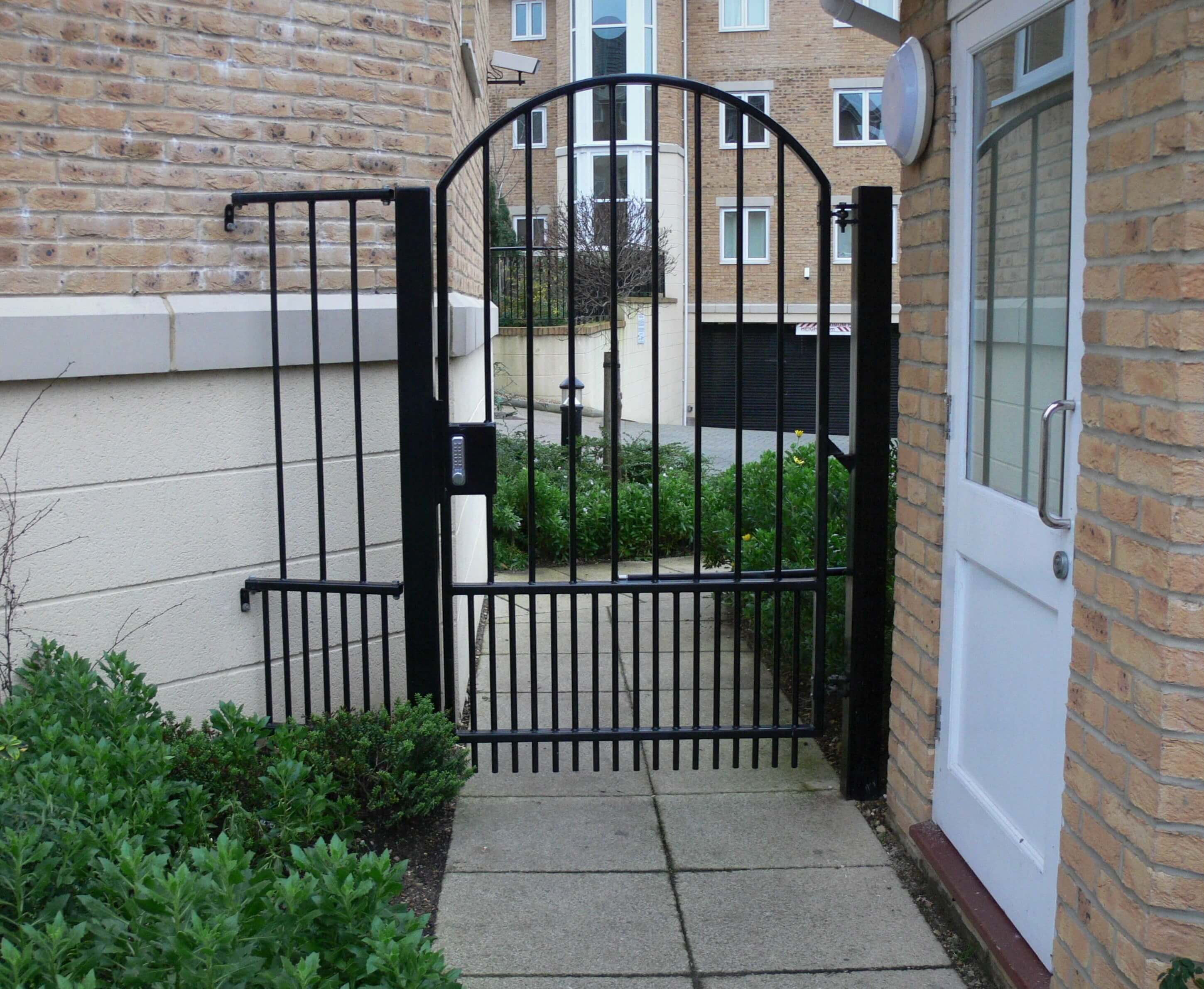 single black security keypad gate