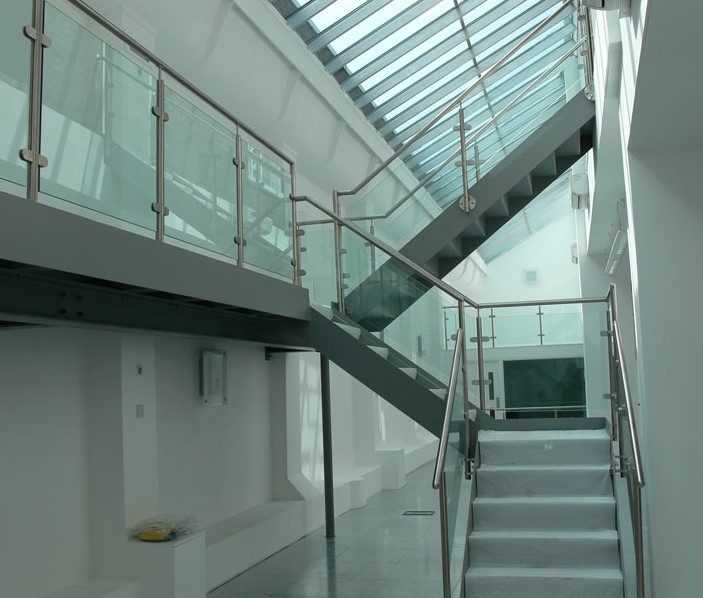 glass balustrading with stainless steel polished handrail